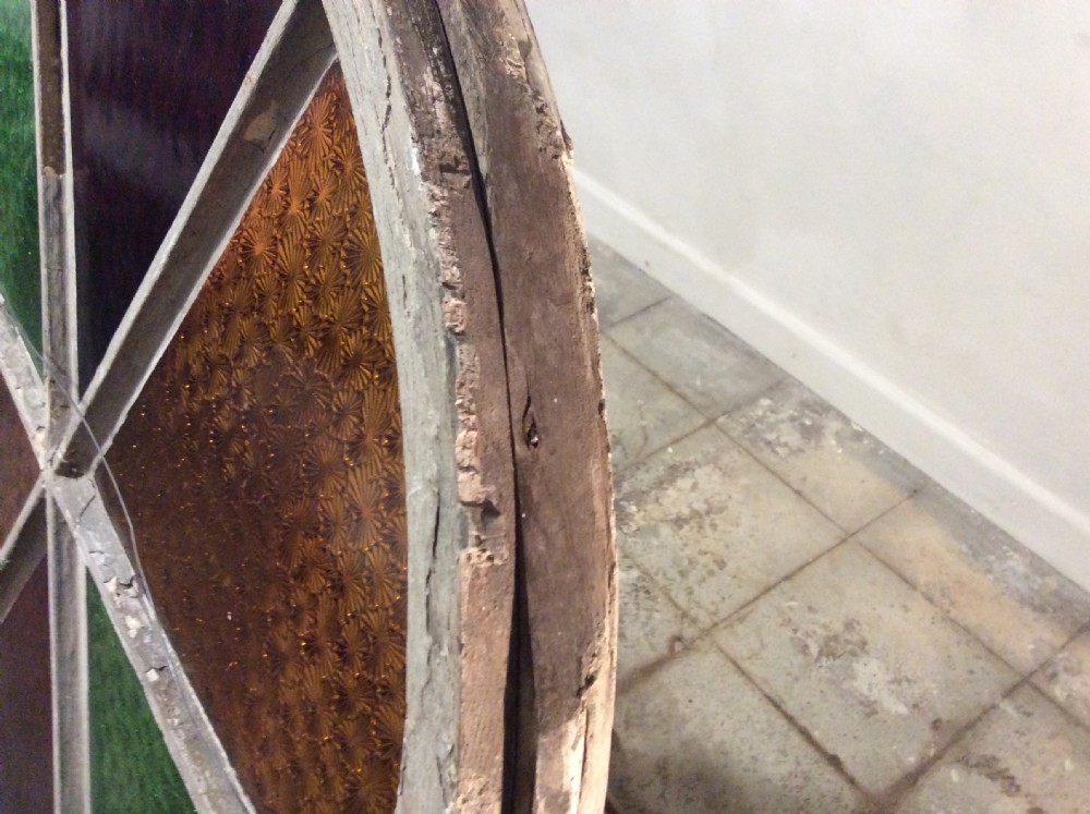 An architectural salvage circular segmented window View X