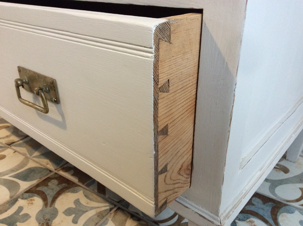 A continental painted pine chest of drawers View V