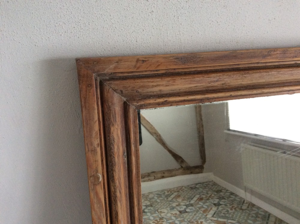 A late 19thC French pine framed mirror View IV