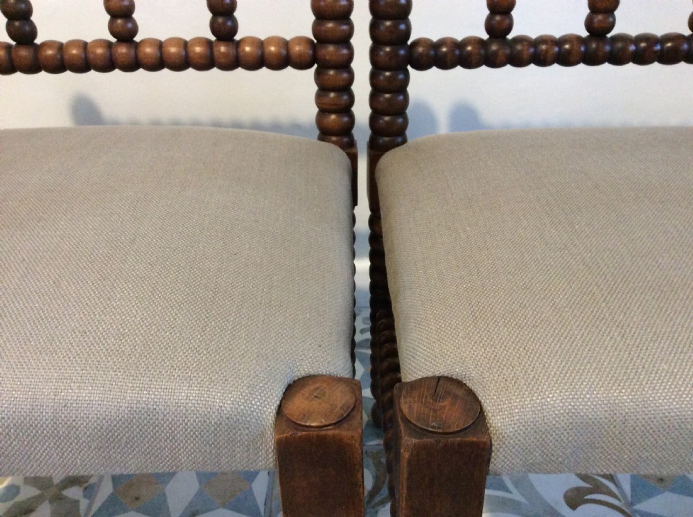 A pair of liberty style bobbin corner chairs View V