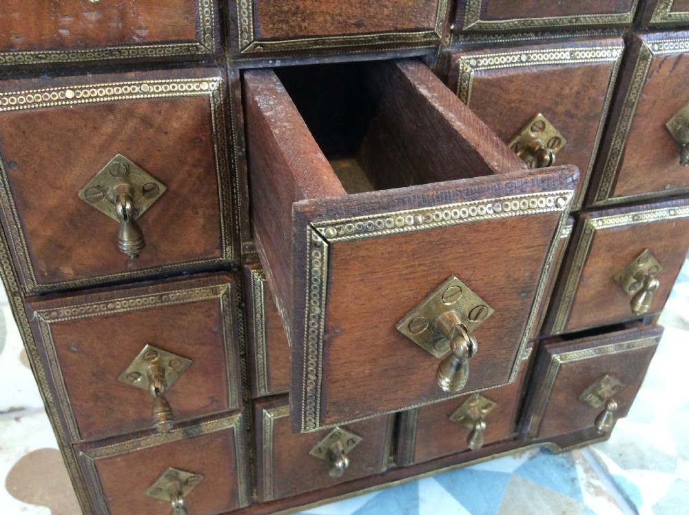 A North Indian bank of spice drawers View V