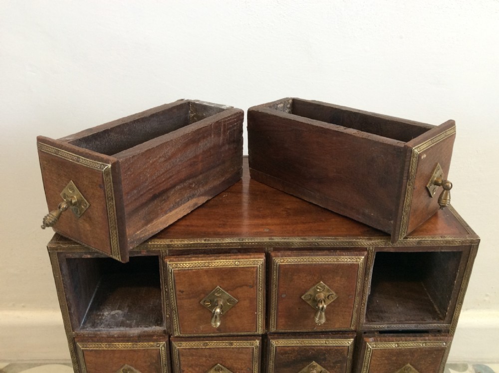 A North Indian bank of spice drawers View X
