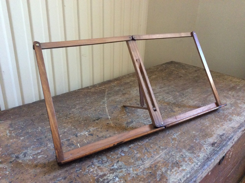 A fruitwood campaign folding music reading stand
