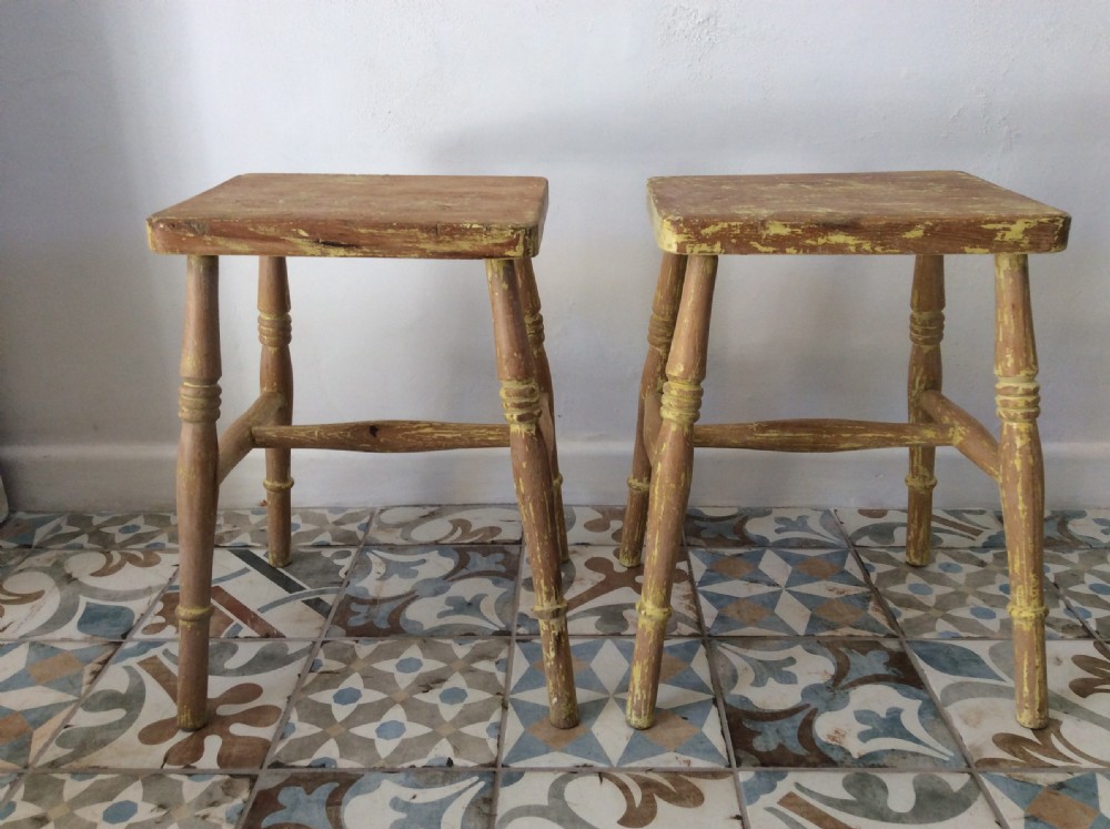 A pair of late Victorian low stools