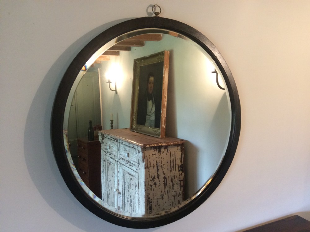 A large Victorian circular wall mirror