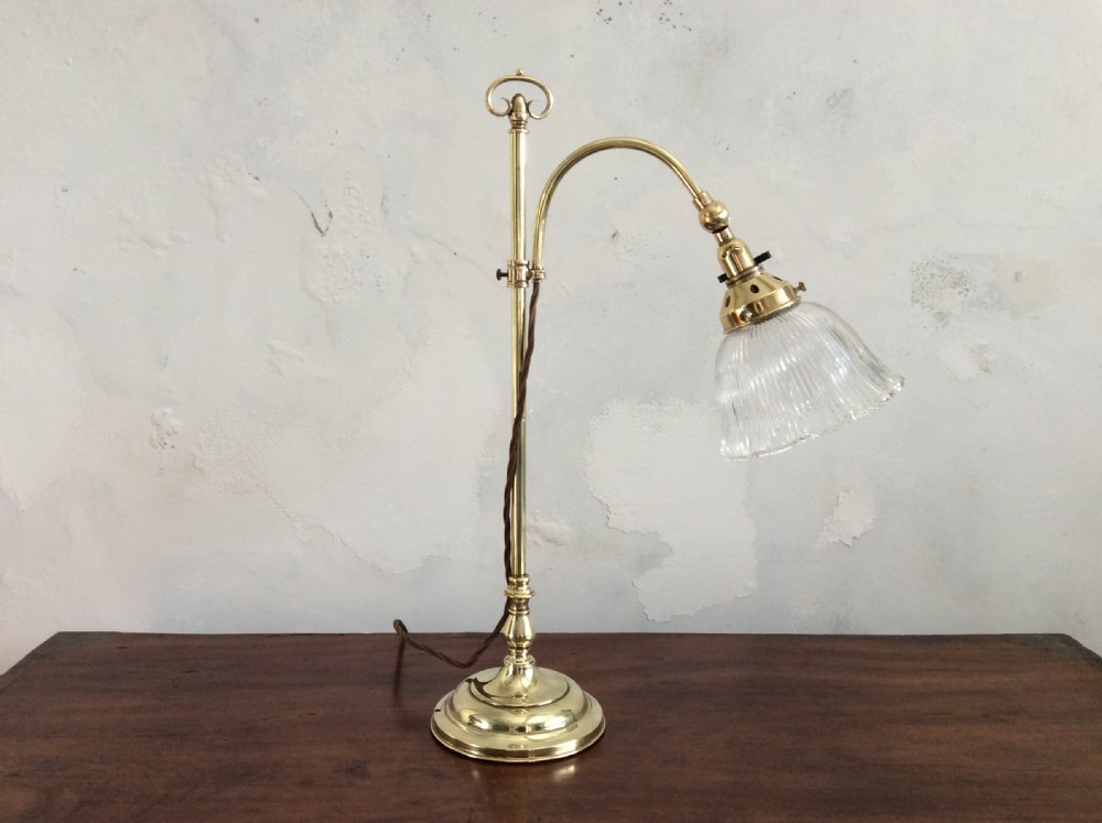 An Edwardian adjustable brass desk lamp
