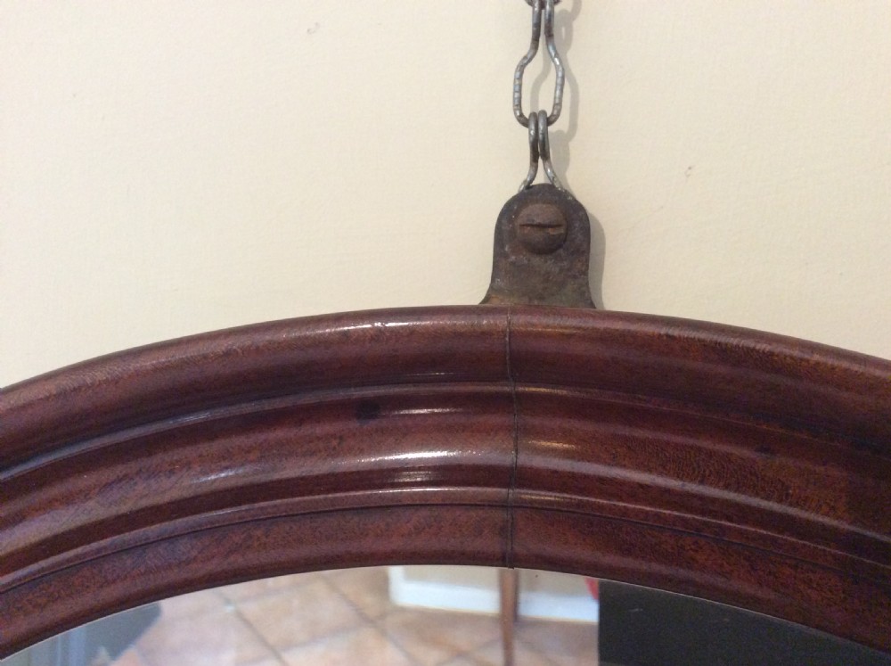 An Edwardian deep framed circular mirror View III