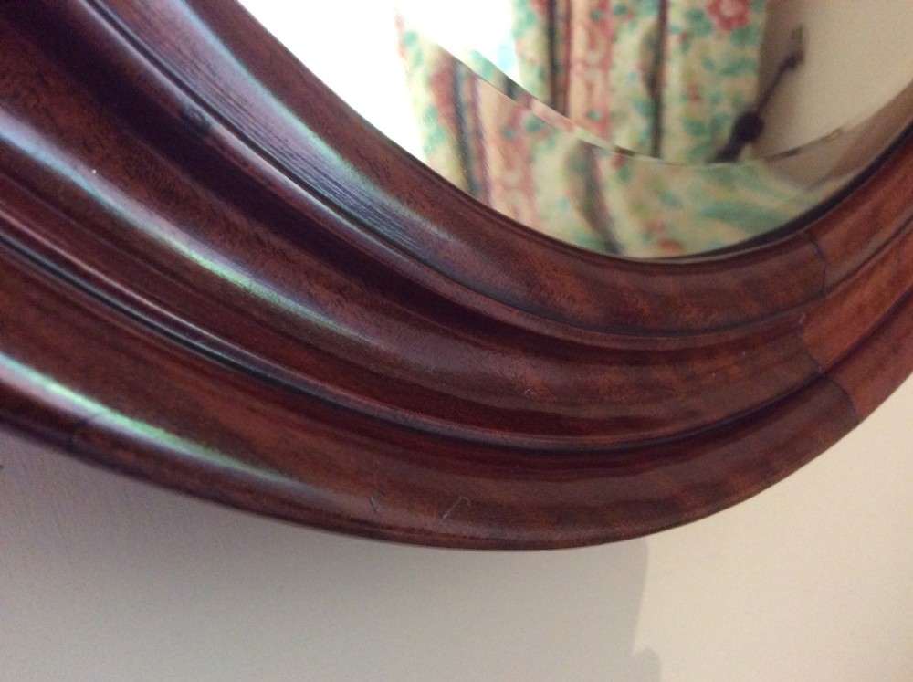 An Edwardian deep framed circular mirror View IV
