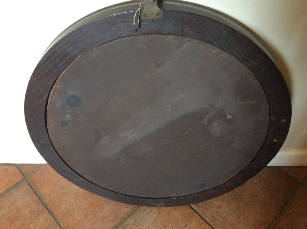 An Edwardian deep framed circular mirror View VII