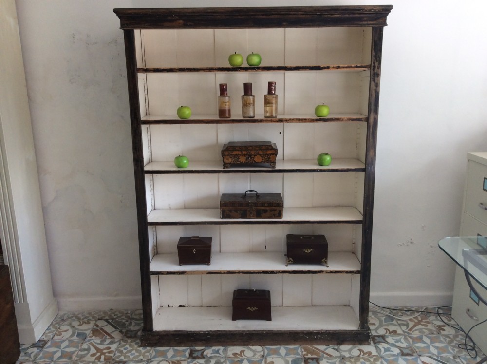 A Victorian painted open bookcase View II