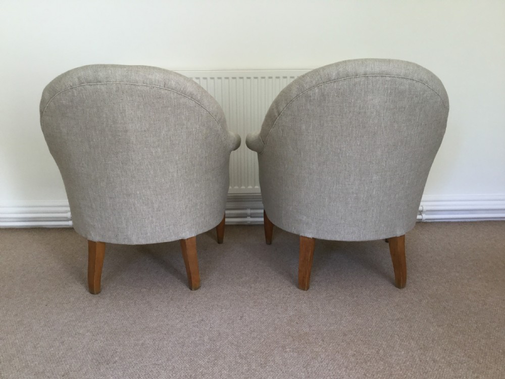 A pair of French upholstered armchairs View III