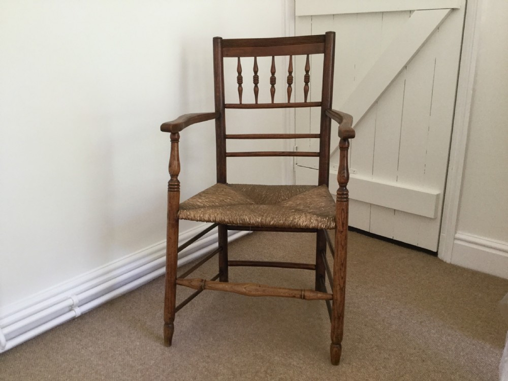 An 18thC rush seat spindle back chair View II