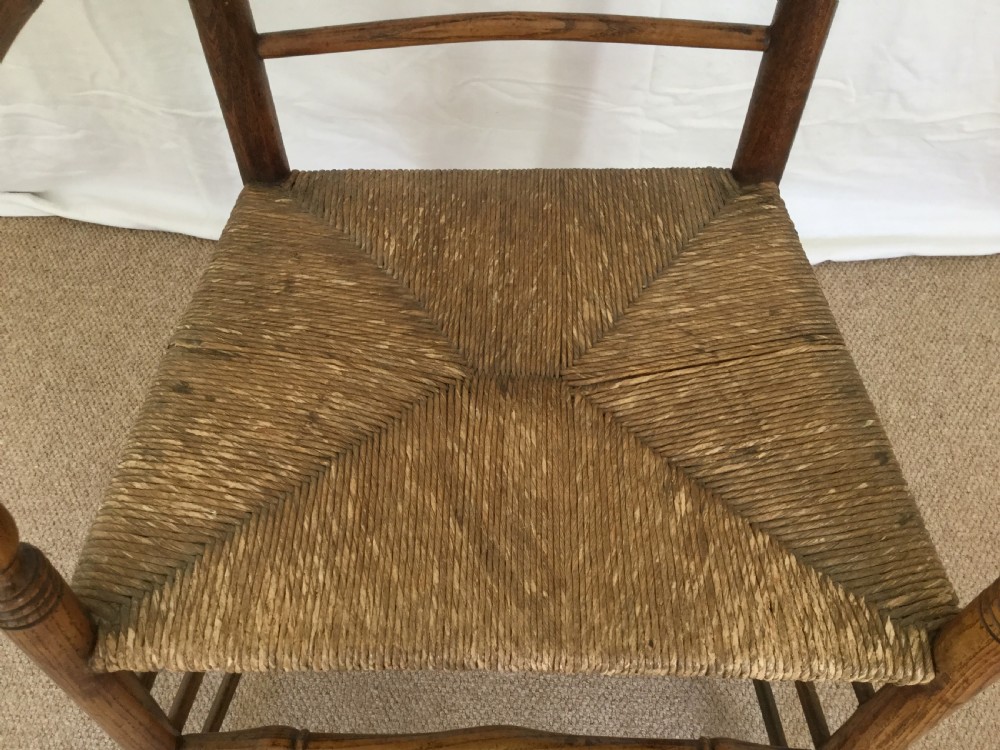 An 18thC rush seat spindle back chair View IV
