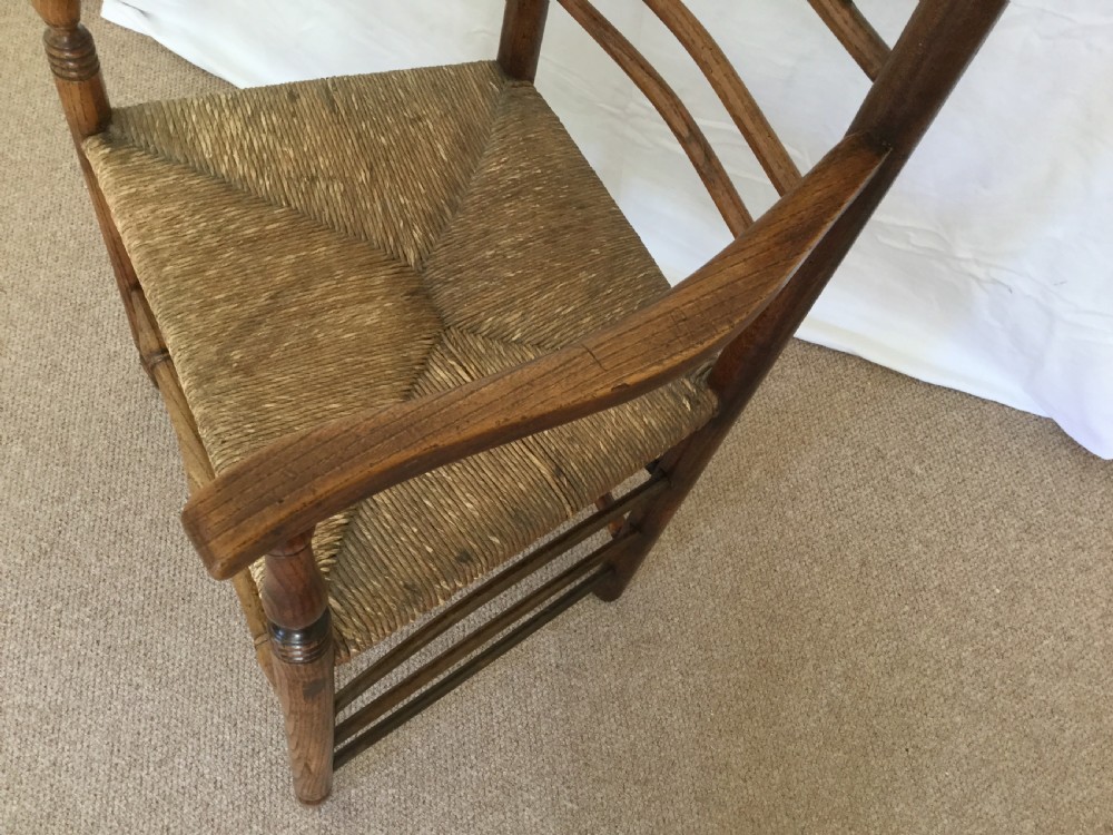 An 18thC rush seat spindle back chair View VIII