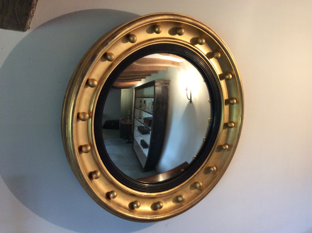 19thC 59cm round convex wall mirror View X
