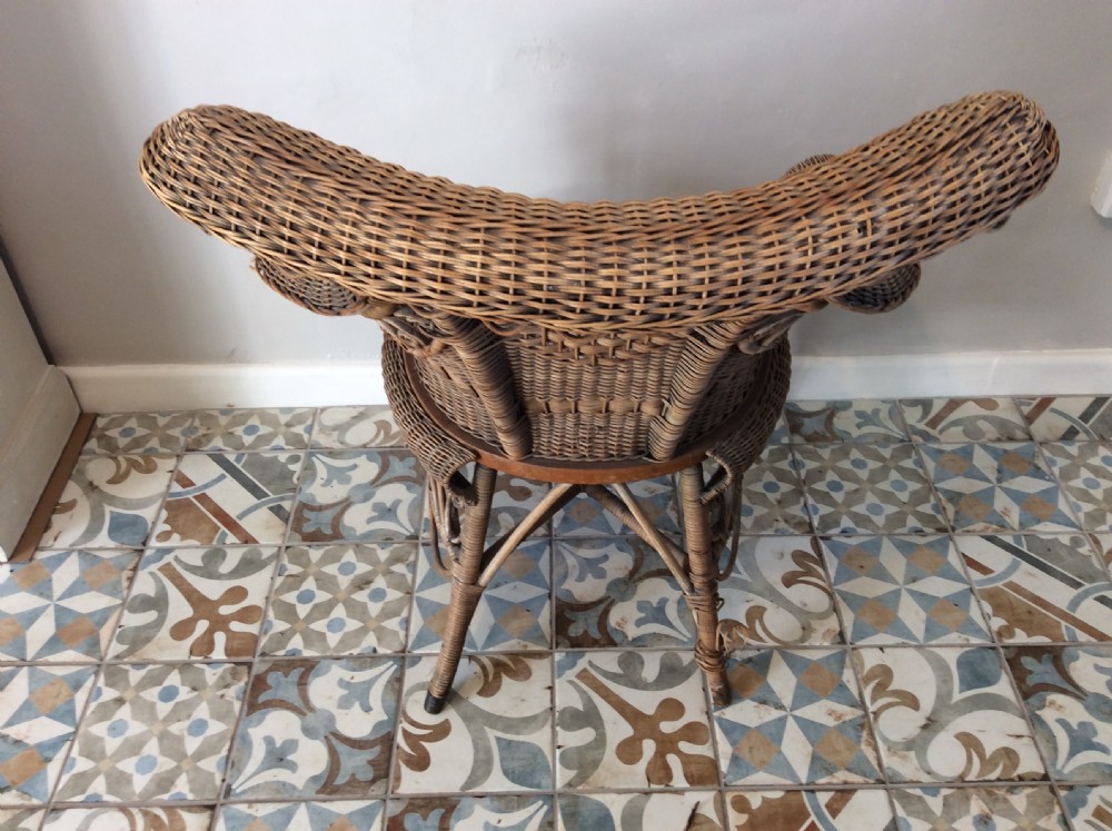 An American Heywood wicker chair View VIII