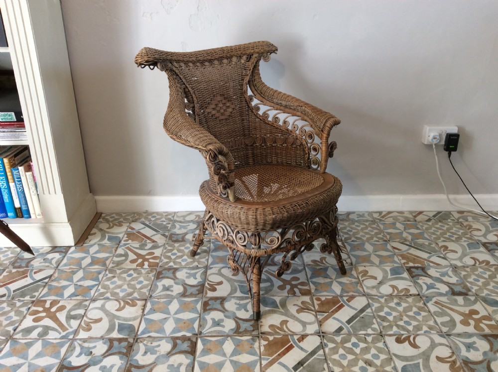 An American Heywood wicker chair View XIII