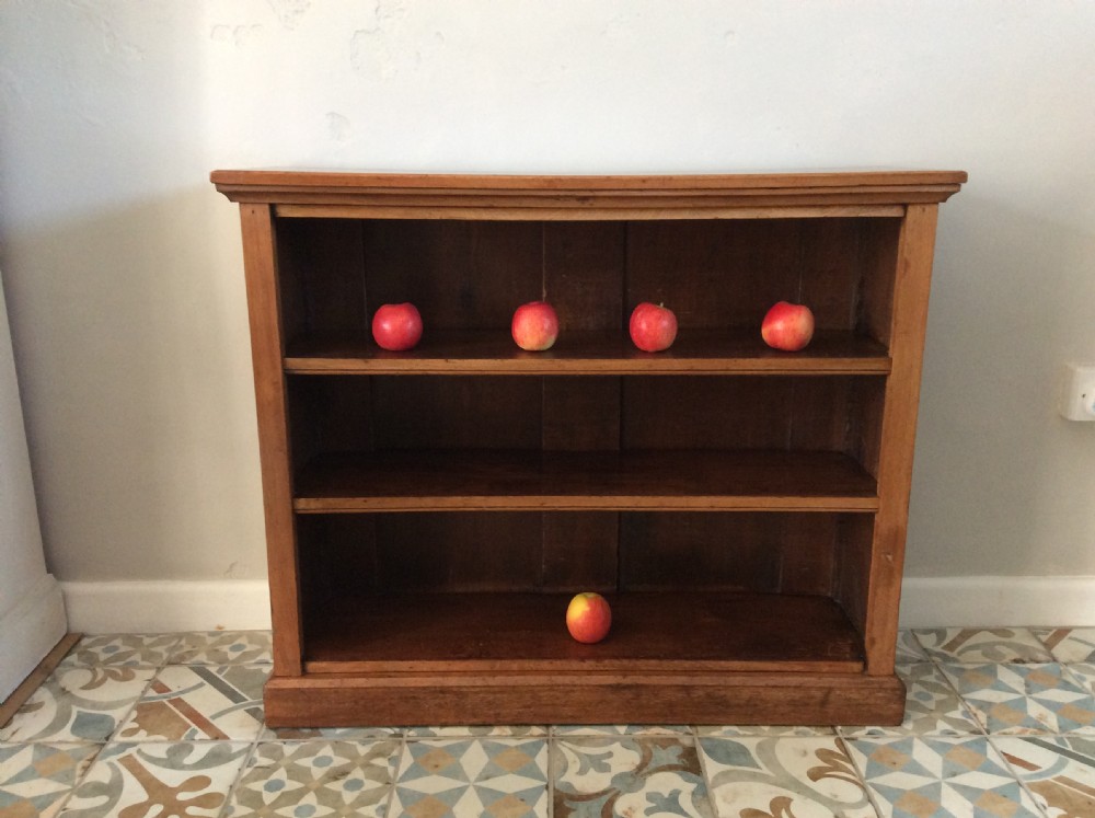 A dwarf open bookcase