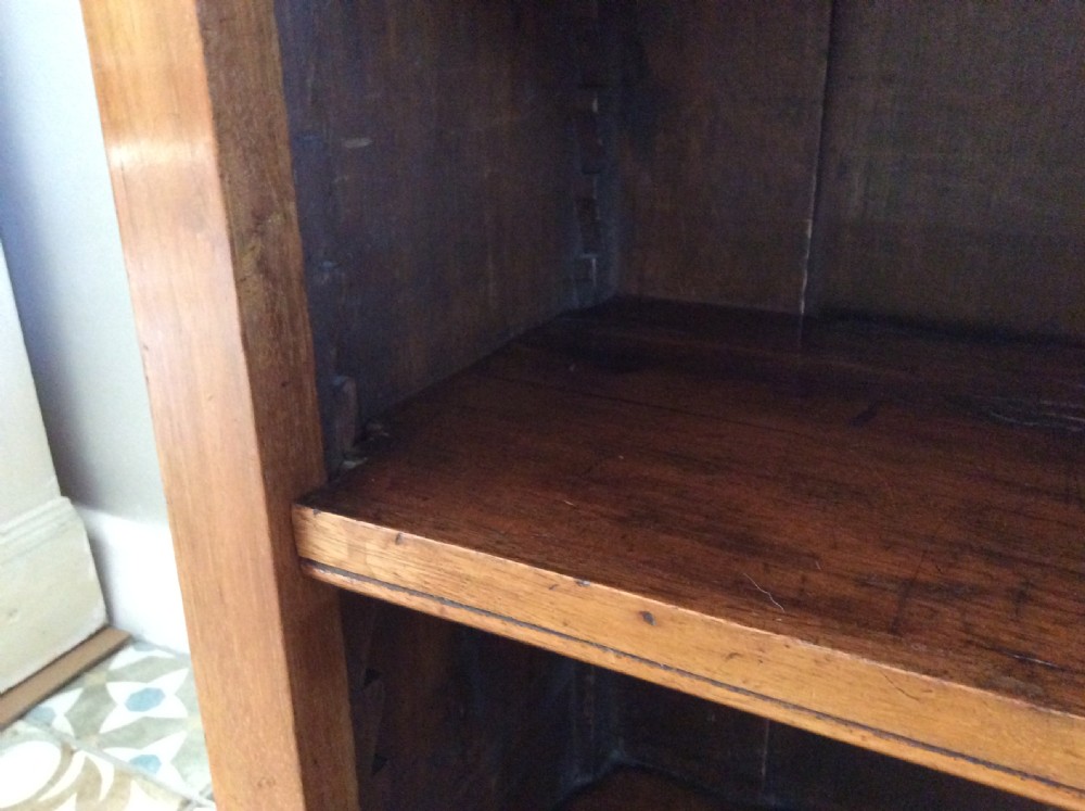 A dwarf open bookcase View VII