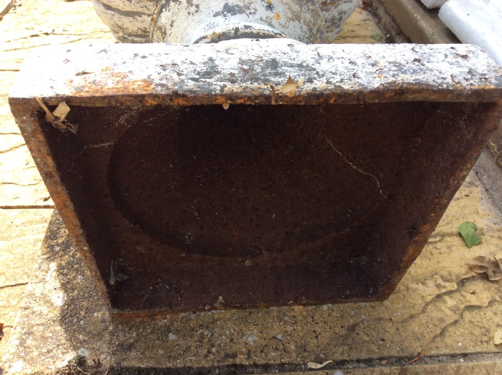 A pair of cast iron garden urns View VII