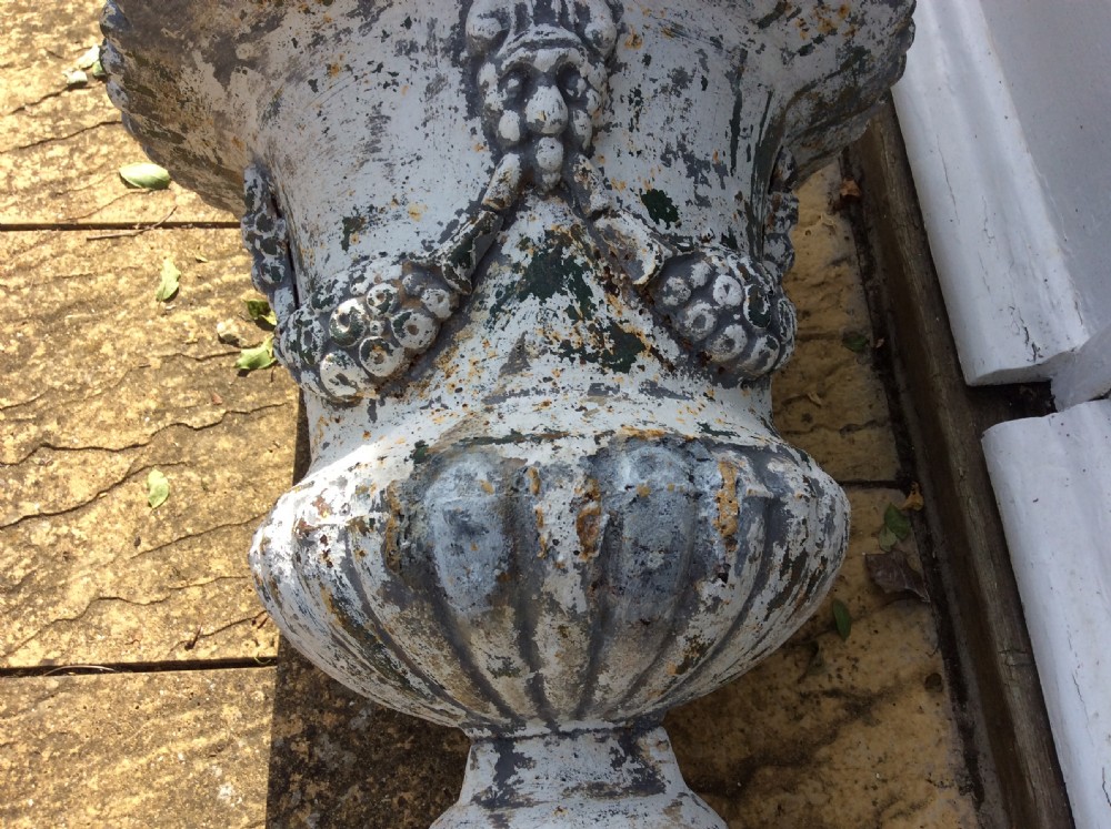 A pair of cast iron garden urns View VIII