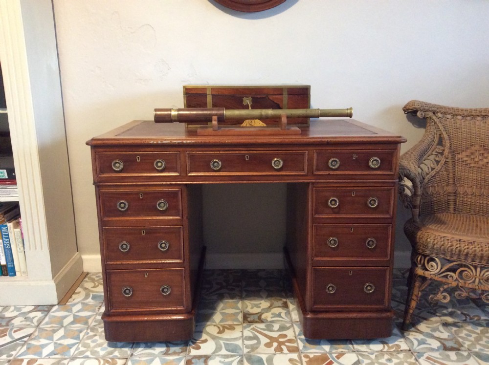 A 19thC 9 drawer pedestal desk View III