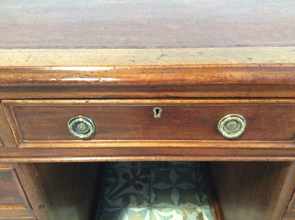 A 19thC 9 drawer pedestal desk View V