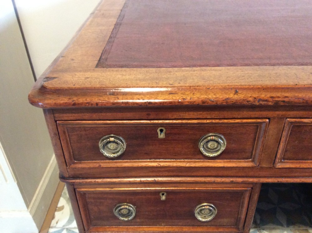 A 19thC 9 drawer pedestal desk View VI