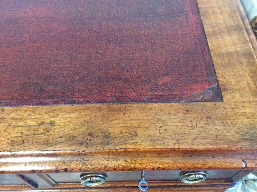 A 19thC 9 drawer pedestal desk View XI
