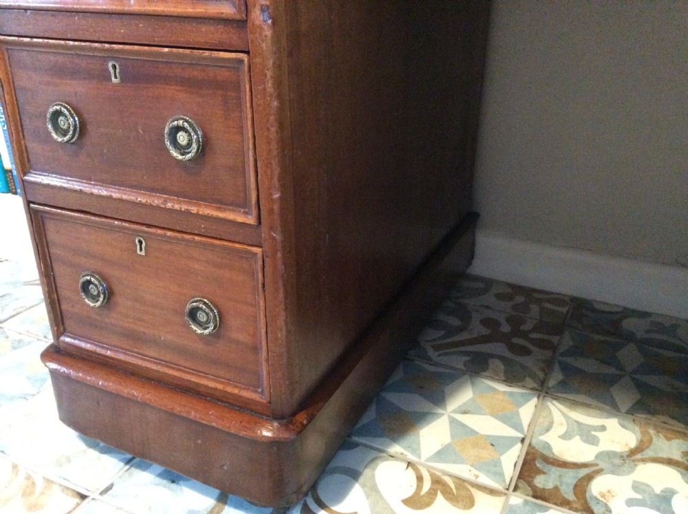 A 19thC 9 drawer pedestal desk View XIX
