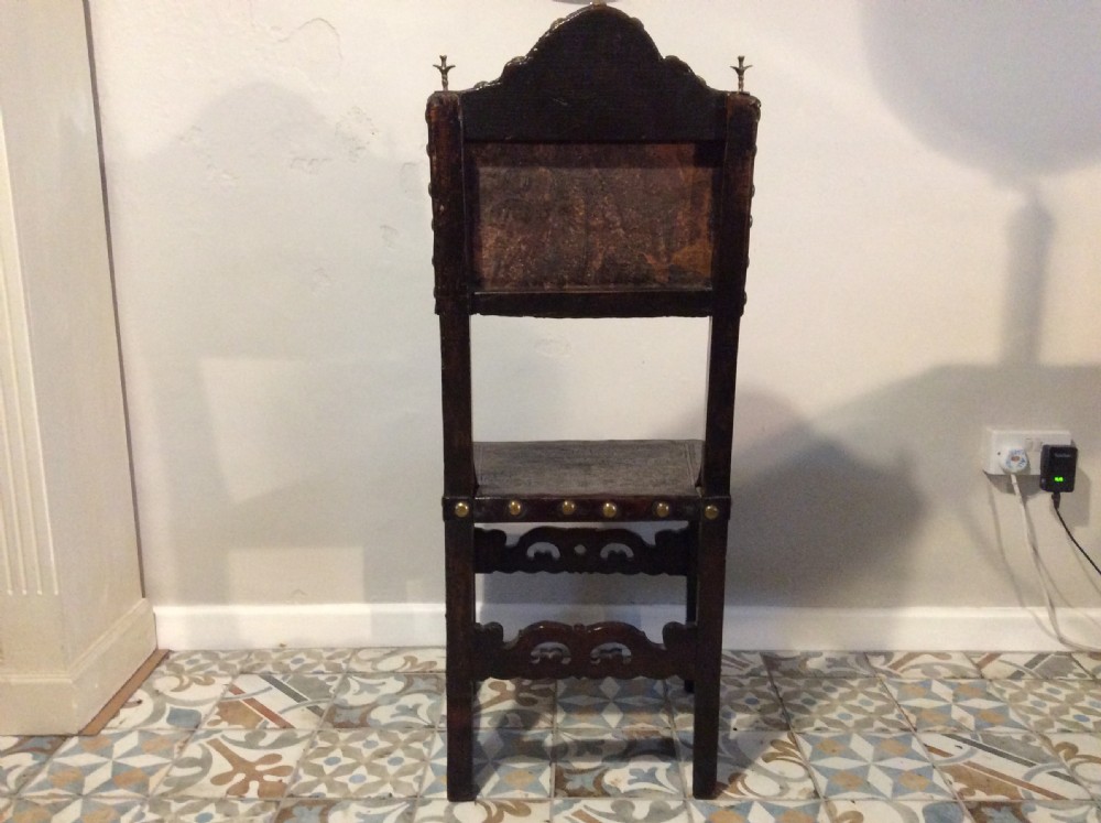 A 17thC Spanish walnut hall chair View VII