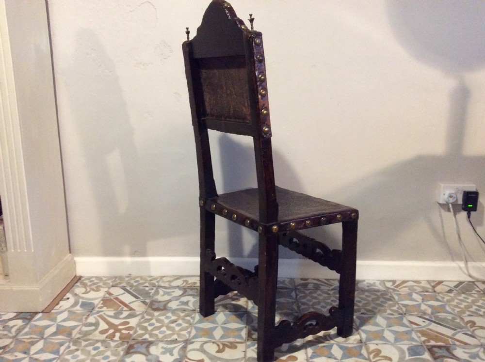 A 17thC Spanish walnut hall chair View IX