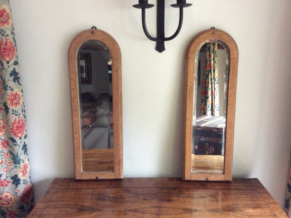 A pair of bleached oak framed pier mirrors View II