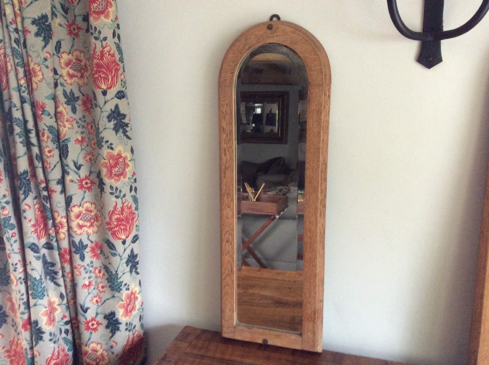 A pair of bleached oak framed pier mirrors View V