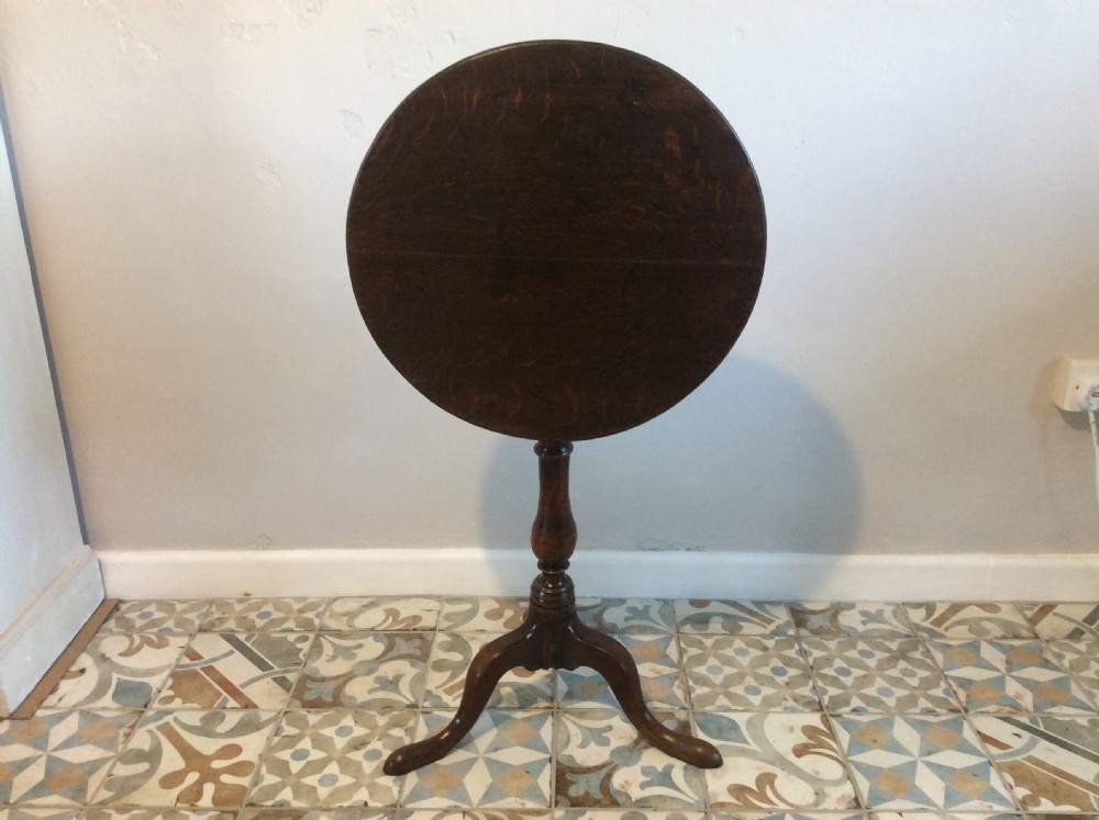 An 18thC oak & elm tripod wine table View IV