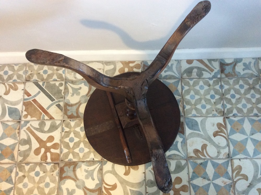 An 18thC oak & elm tripod wine table View XI