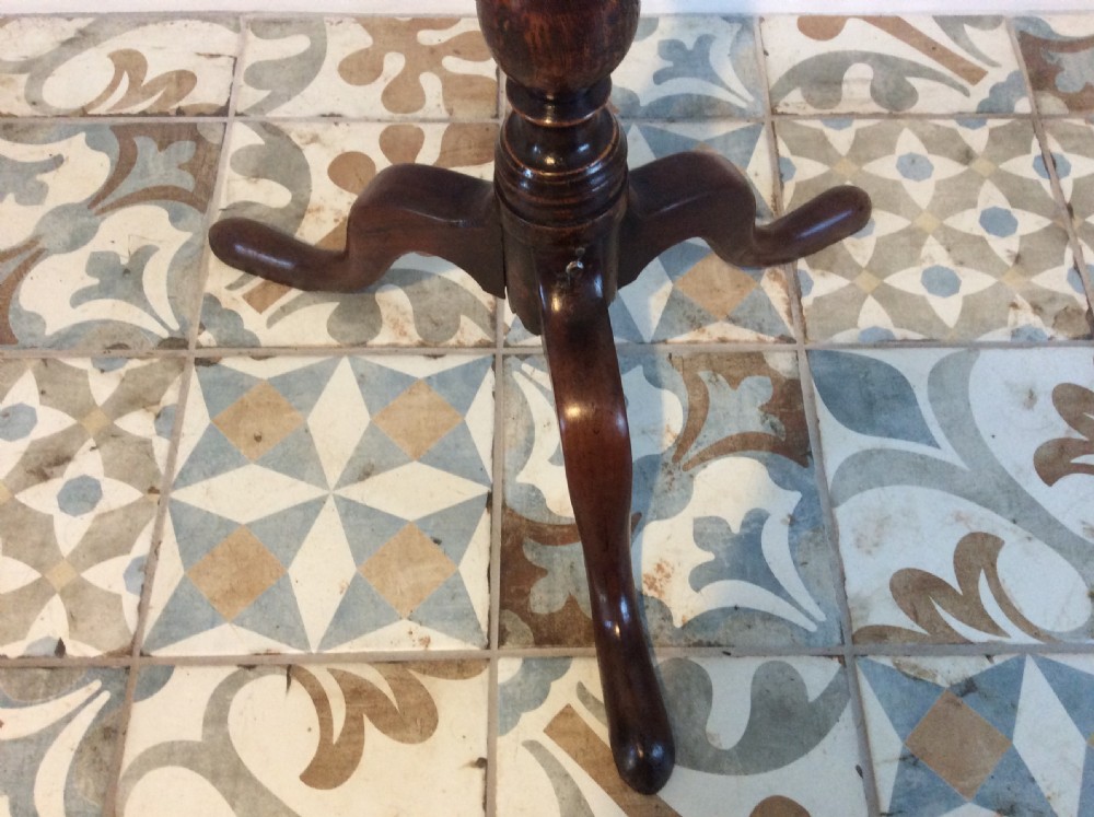 An 18thC oak & elm tripod wine table View XII