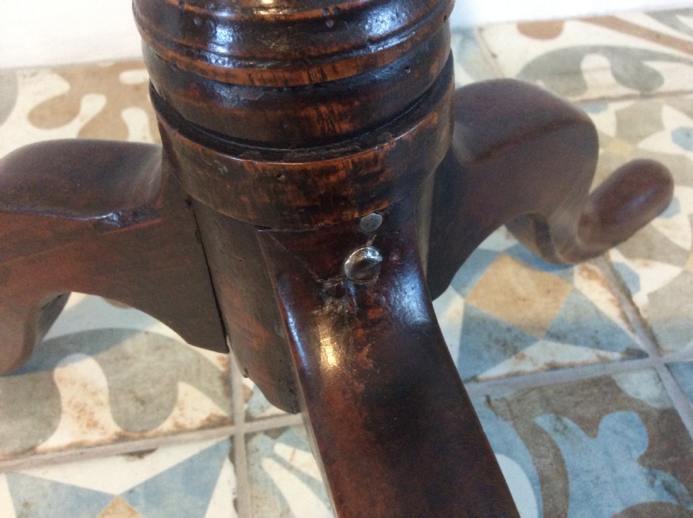 An 18thC oak & elm tripod wine table View XIII