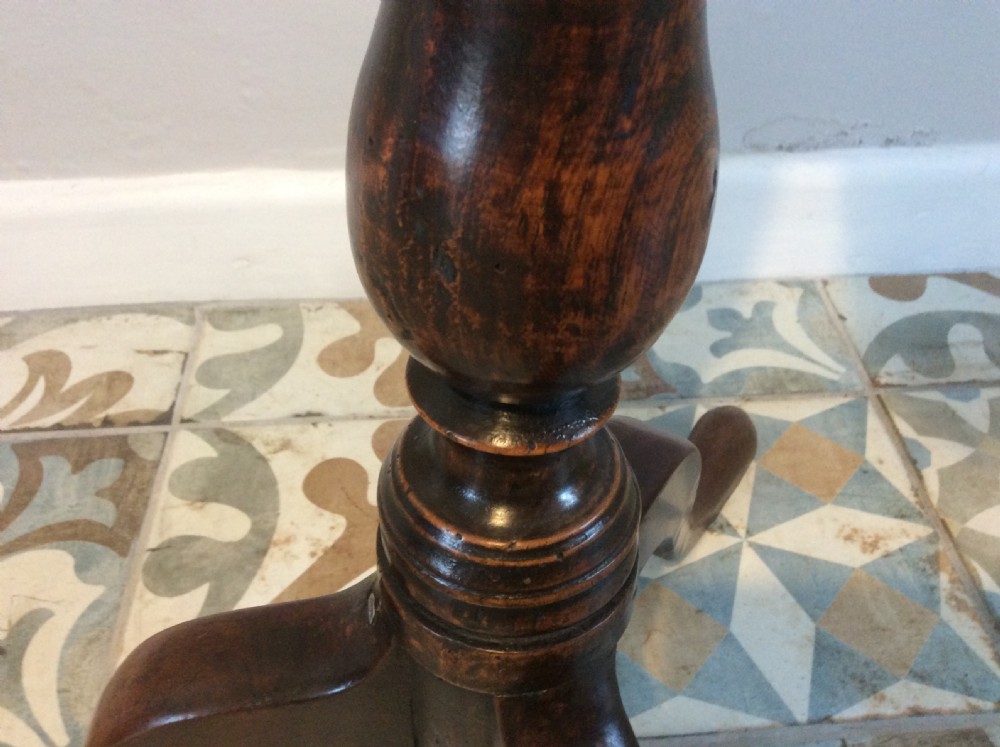 An 18thC oak & elm tripod wine table View XIV