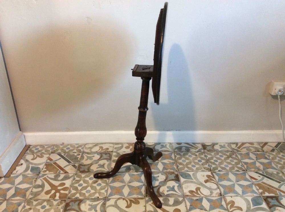 An 18thC oak & elm tripod wine table View XV
