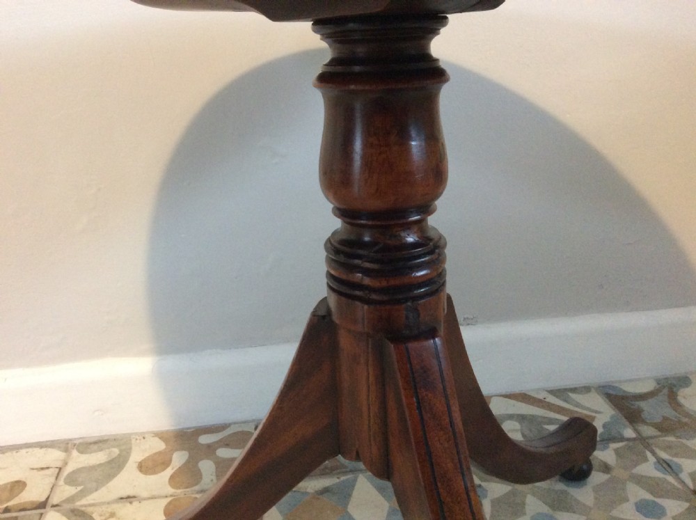 A 19thC low dish top tripod table View VII