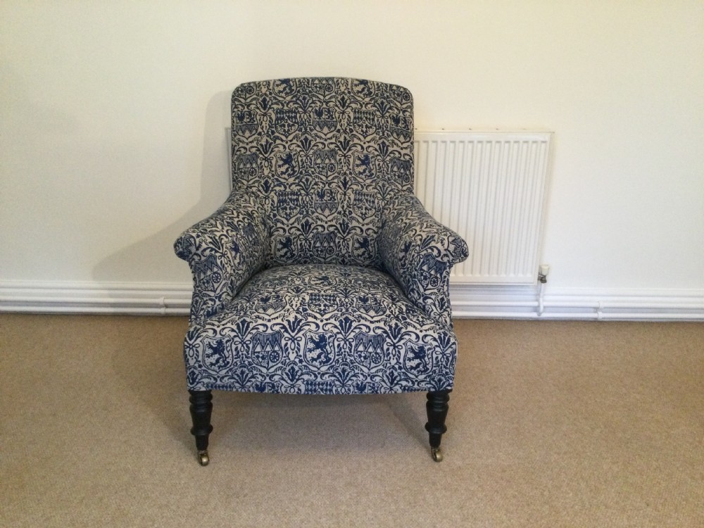 A French upholstered armchair