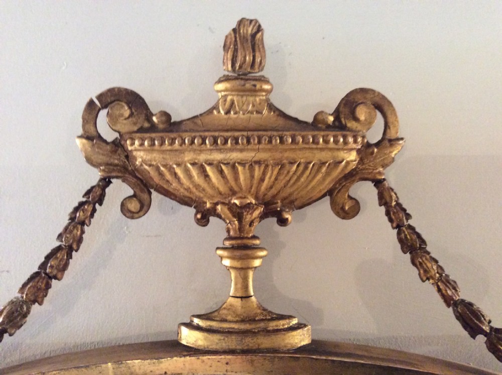 A small  gilded19thC Adams style mirror View II