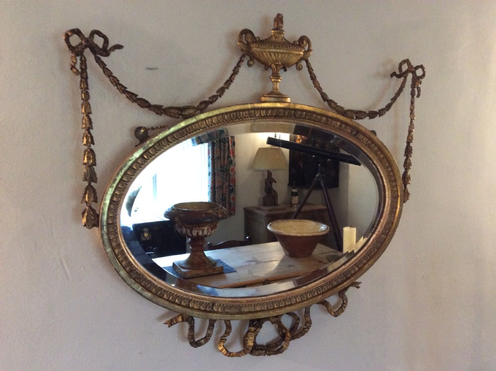A small  gilded19thC Adams style mirror View III