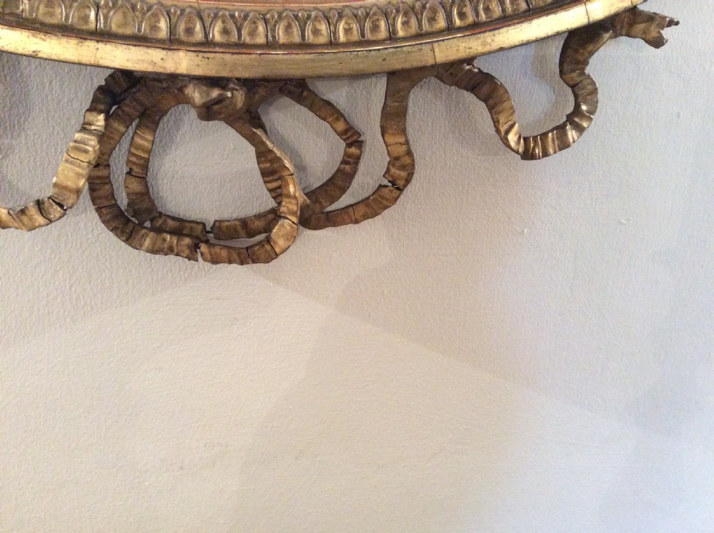 A small  gilded19thC Adams style mirror View V