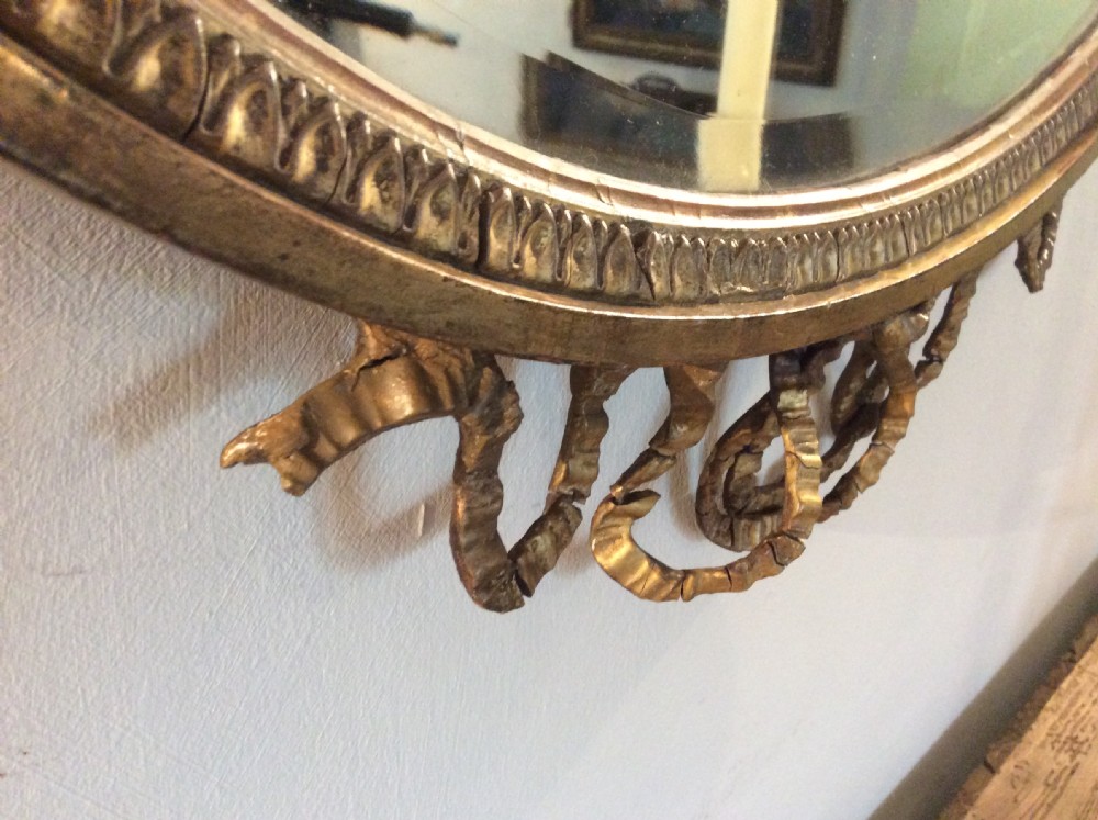A small  gilded19thC Adams style mirror View VIII
