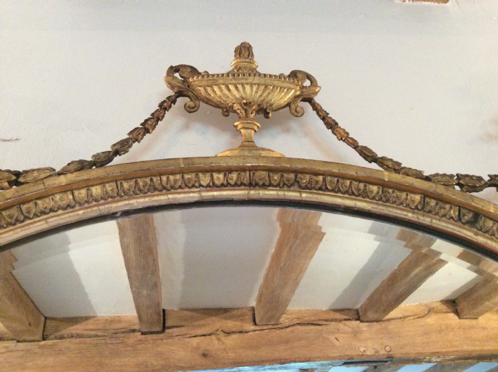A small  gilded19thC Adams style mirror View IX