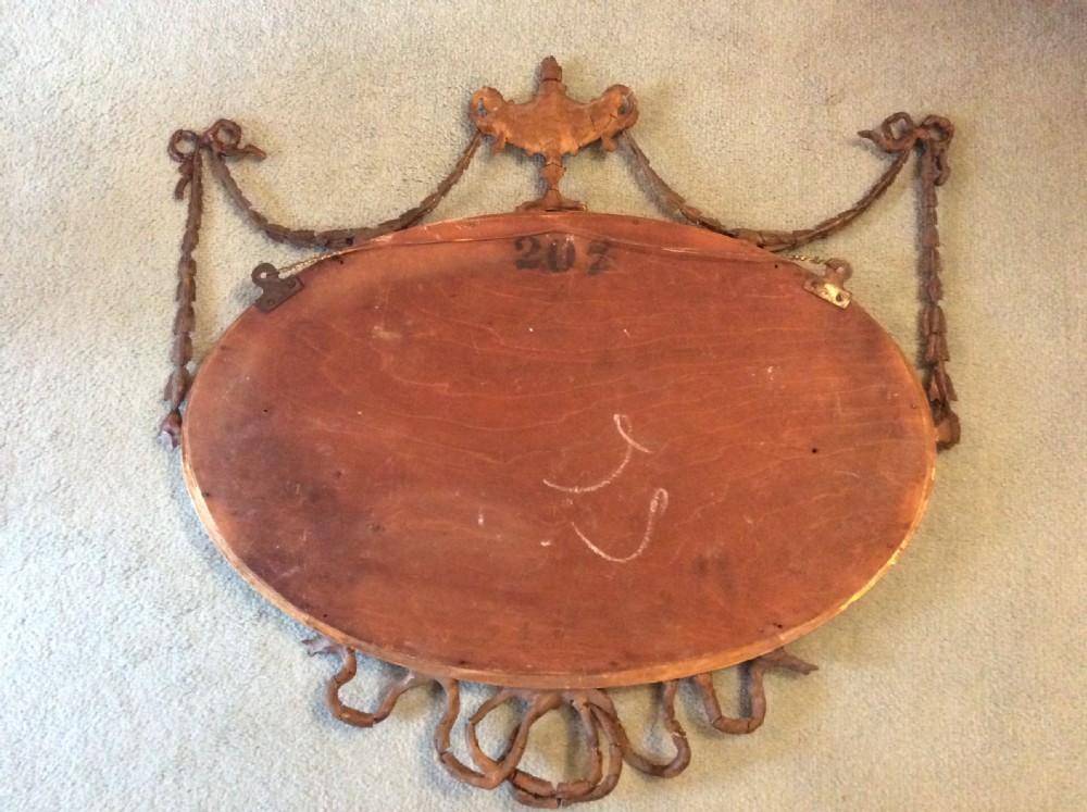 A small  gilded19thC Adams style mirror View X