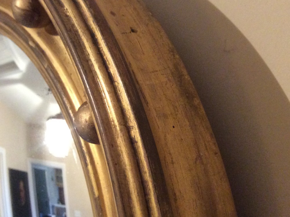 An early 19thC convex wall mirror View V