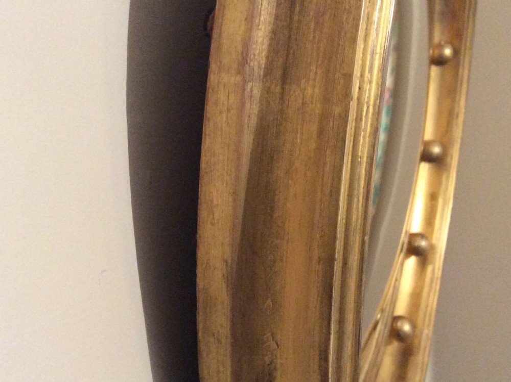 An early 19thC convex wall mirror View VII
